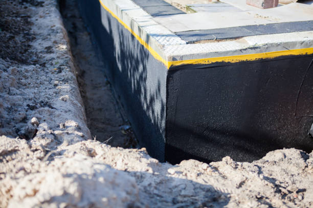 Professional Waterproofing technician working in La Salle, MI